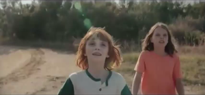 Girls Watching Rocket Launch. From OppenhiemerFunds Commercial: Invest in a Beautiful World (youtube via RocketMcGee.com)